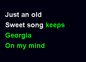 Just an old
Sweet song keeps

Georgia
On my mind