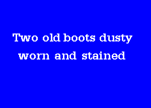 Two old boots dusty

worn and stained