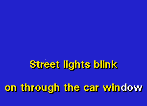 Street lights blink

on through the car window