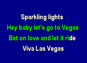 Sparkling lights
Hey baby let's go to Vegas
Bet on love and let it ride

Viva Las Vegas