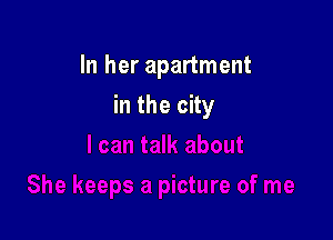 In her apartment

in the city