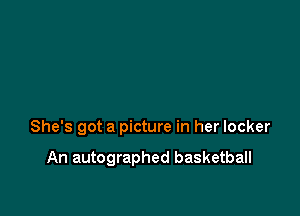 She's got a picture in her locker

An autographed basketball