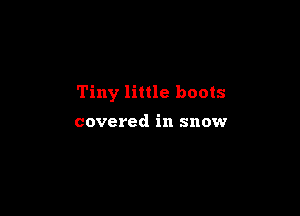 Tiny little boots

covered in snow