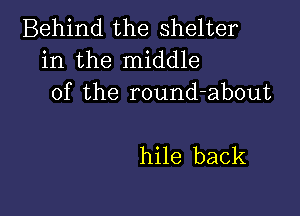 Behind the shelter
in the middle
of the round-about

hile back