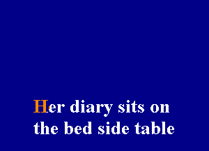 Her diary sits on
the bed side table