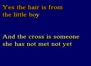 Yes the hair is from
the little boy

And the cross is someone
she has not met not yet