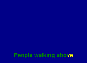People walking above