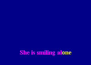 She is smiling alone