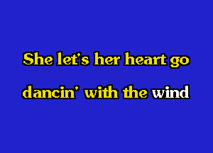 She let's her heart go

dancin' with the wind