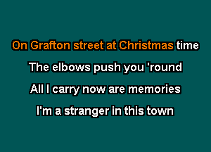 0n Grafton street at Christmas time
The elbows push you 'round
All I carry now are memories

I'm a stranger in this town
